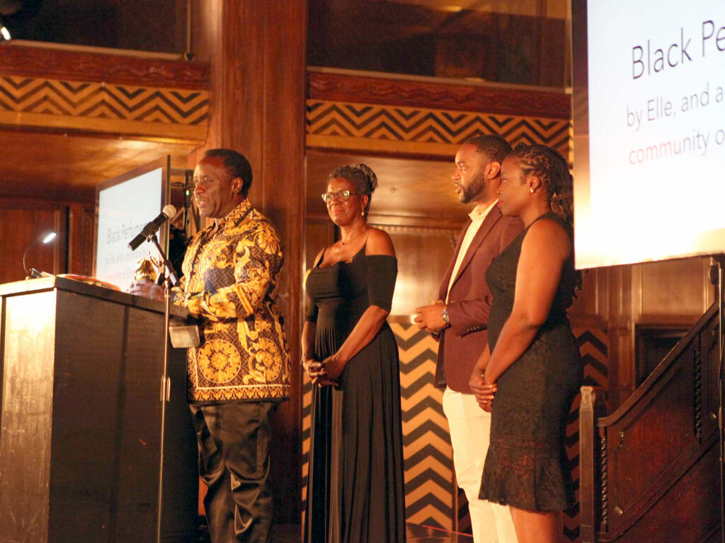 Perfumers Terry Carter, Lakenda Wallace, Ethan Turner, and Tatiana Fortune accept the Contribution to Scent Culture Award on behalf of the Black Perfumers collective. 